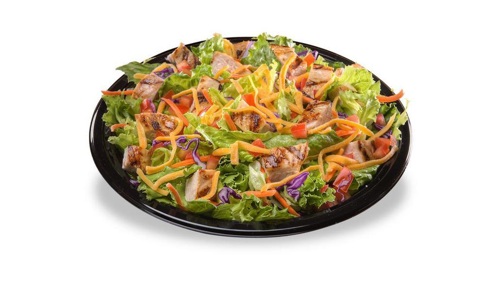Grilled Chick'N Salad · Romaine salad mix with red cabbage and carrots, bacon, shredded cheddar cheese, tomatoes and choice of dressing (ranch, honey mustard or Italian) and grilled chicken breast.