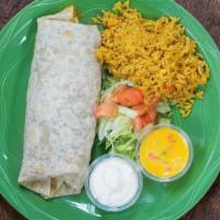 Fajita Burrito · Large flour tortilla filled with beans & choice of beef or chicken fajitas top with chili co...