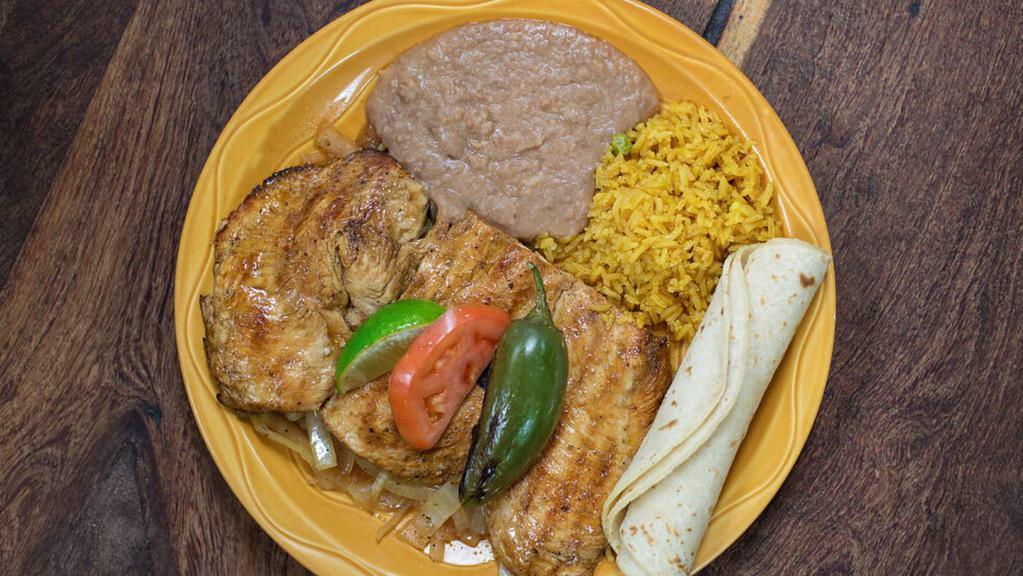 Pechuga Asada - Chicken Breast · Served fresh from the mesquite grill. Served with rice and beans.