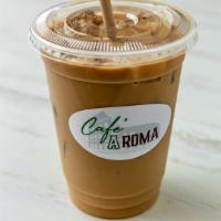 Iced Latte · Espresso poured over ice with milk. Add your favorite flavor shot to create your own