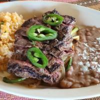 Beef Fajita Plate( Chef Favorites) · seasoning grill skirt steak / onions / green bell pepper / red bell pepper / arroz rojo / pi...