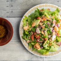 Fattoush · One of the most well known Middle Eastern salads. A colorful tossed salad of lettuce, parsle...