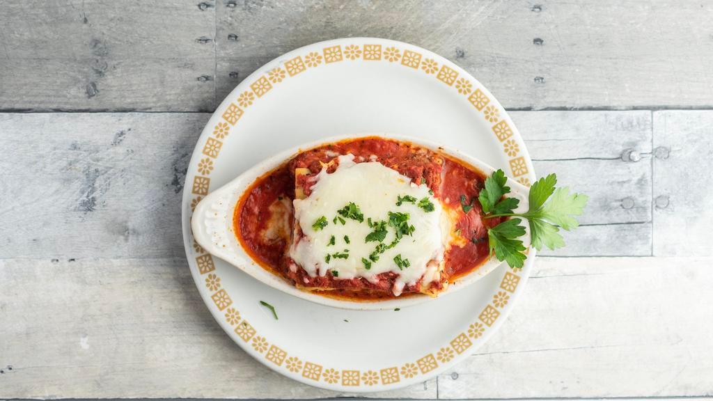 Lasagna · Layers of pasta, Beef, and Ricotta cheese in our Marinara sauce and topped with Mozzarella cheese.