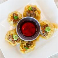 Dumpling Fried (5) · Shredded shrimp, pork, water chestnut wrapped in wonton and served with sweet & sour sauce.