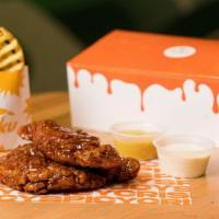 Sweet & Spicy Fuku Fingers Meal · Crispy 3-piece Sweet & Spicy Fuku Chicken Fingers with Crispy Golden Waffle Fries with Sweet...