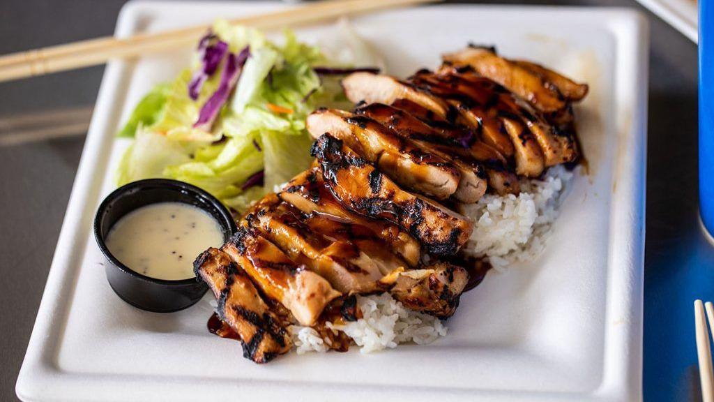 Chicken Teriyaki · Over a half pound of marinated chicken, grilled to perfection. Covered in fresh teriyaki sauce and served over a bed of rice with a simple side salad.