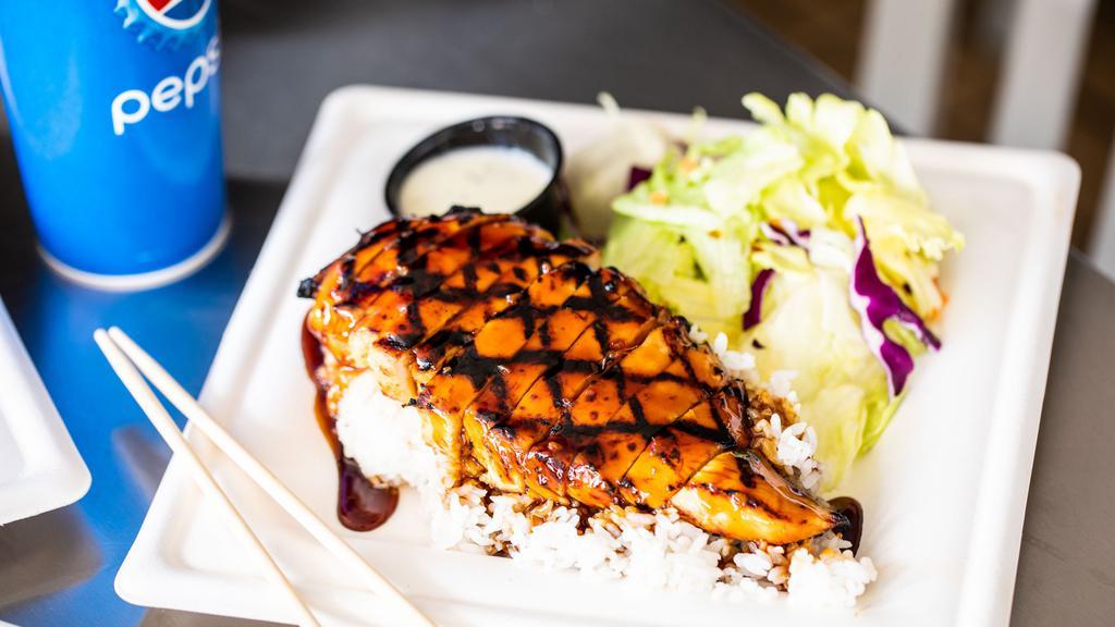 Chicken Breast Teriyaki · Over a half pound of marinated chicken breast, grilled to perfection. Covered in fresh teriyaki sauce and served over a bed of rice with a simple side salad.