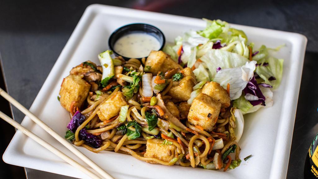 Tofu Yakisoba · Crispy diced firm tofu served with stir-fry noodles, our irresistible salty-sweet yakisoba sauce and mix vegetables.