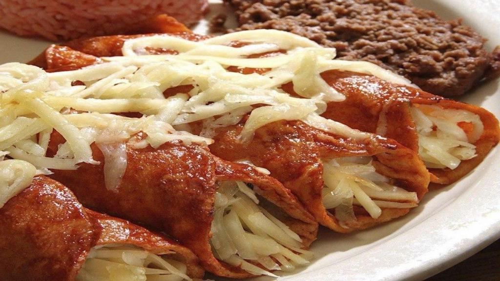 Red Enchiladas · 4 Red enchiladas with cheese, rice, beans, sour cream, chopped onion.