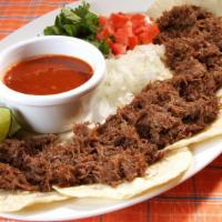 Beef Barbacoa Tacos · 5 Beef Barbacoa tacos, cilantro, chopped onion, cabbage, charro beans 8oz. 2 hot sauces 2oz....