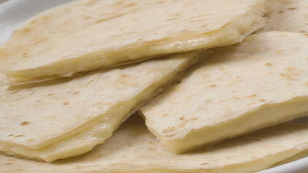 Cheese Quesadilla · Two cheese quesadilla flour tortilla. 
2 hot sauces 2oz.ea.