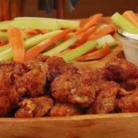 Chih'Ua Wings · 8 chicken wings (to choose:  Bufalo,  BBQ),
 carrots, celery, ranch dressing