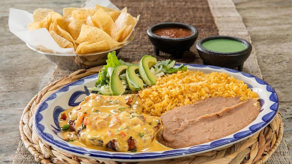 Cancun Chicken · Grilled chicken breast loaded with pico de gallo and smothered in queso served with sliced avocado and your choice of beans & rice. (Refried beans and Mexican rice Default)