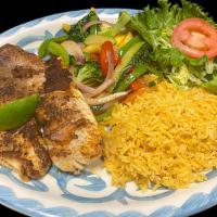 Blackened Tilapia · Blackened Tilapia served with Mexican rice and grilled vegetables.