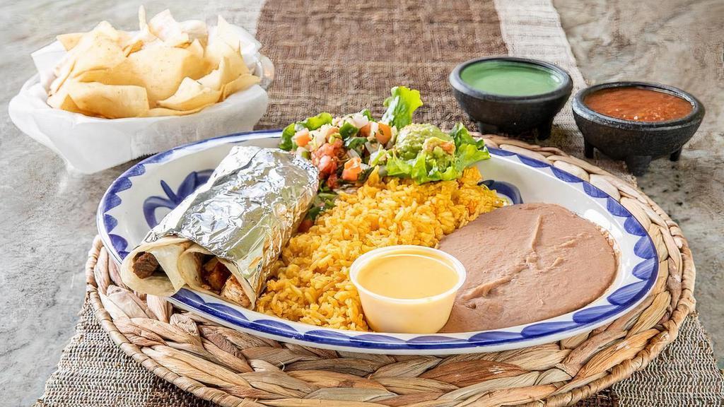 Tacos Al Carbon Dinner · 2 Chicken, Beef Fajita or combination fajita tacos served with guacamole, pico, queso and your choice of beans & rice. (Refried beans and Mexican rice Default)