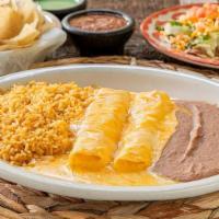 Laredo · 2 Cheese enchiladas topped with queso and grated cheese, bean tostada, guacamole, your choic...