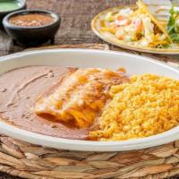 Especial Dinner · 2 cheese enchiladas topped with Chile con carne and grated cheese, ground beef taco, guacamo...