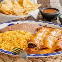Fajita Enchilada Dinner · Fajita enchiladas topped with chili con carne and grated cheese.  Served with your choice of...