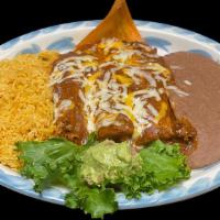 Housemade Tamale Dinner · House-made Pork Tamales topped with chili gravy and melted cheese and served with your choic...