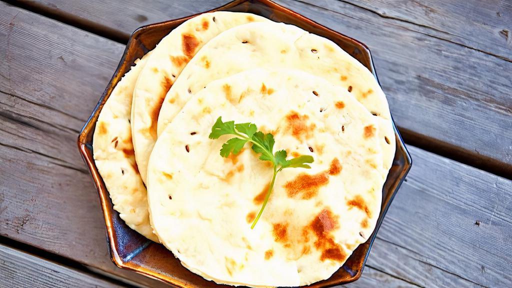 Butter Naan (Vegetarian) · Vegetarian (Our Vegetarian food includes dairy & cheese, but no meat products). Flat, fluffy, round Indian bread