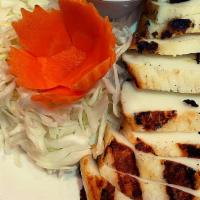 Grilled Calamari  · Served with Ploy’s special sweet chili sauce