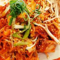 Pad Thai  · Stir-fried thin rice noodles with choice of meat, egg, green onions, bean sprouts, and crush...