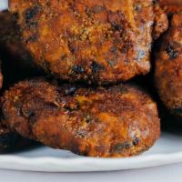 Chicken Cutlet · Chicken and potatoes finely chopped and cooked with intense spices, fried and served with sa...