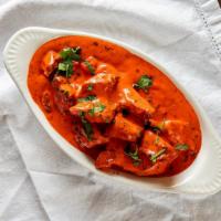 Chicken Tikka Masala · Pieces of boneless chicken cooked in a sauce made from ginger, garlic, coriander leaves, gre...