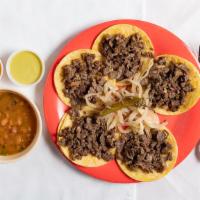 Tacos De Bistec · Five delicious steak street tacos served on small corn tortillas.