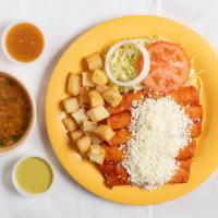 Enchiladas · Five slightly fried corn tortillas in red pepper sauce stuffed with fresh cheese or shredded...