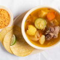 Caldo De Res · Delicious hearty Mexican beef soup with vegetables, served with rice.