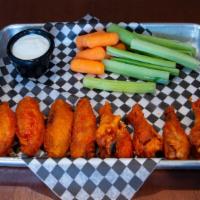 Buffalo Wings · Choose from 6 or 10 Wings, tossed with any of our sauces or dry rubs. Served with carrots, c...