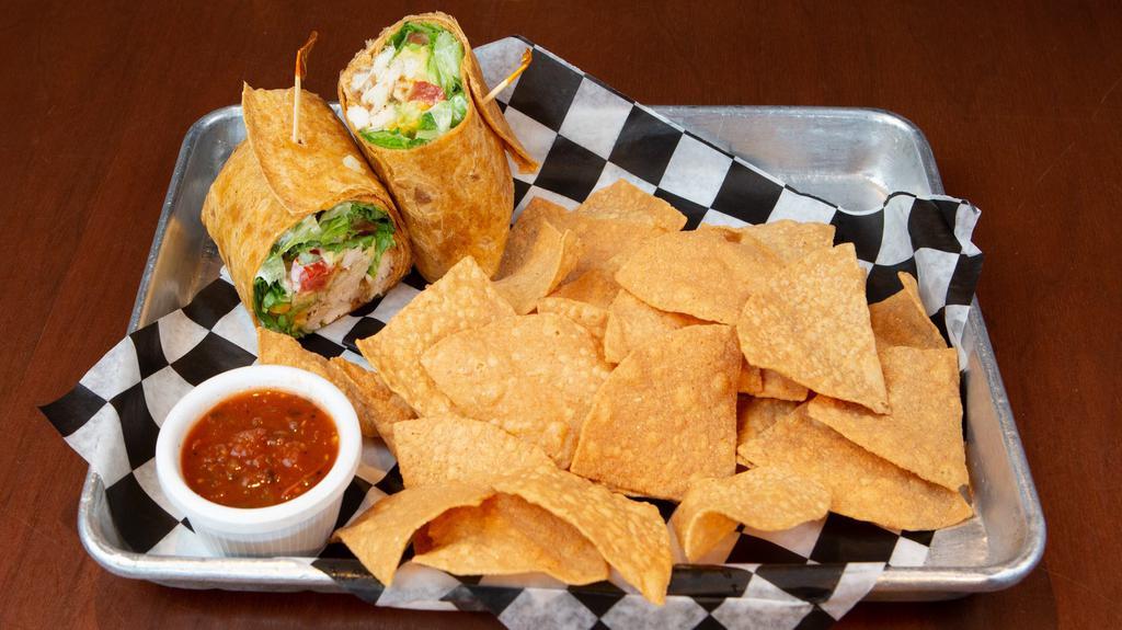 Buffalo Chicken Wrap · Fried chicken and buffalo chunks with Shredded Monterey Jack, Lettuce, Tomatoes and Ranch wrapped in a Chipotle tortilla served with a side of Chips and Salsa.