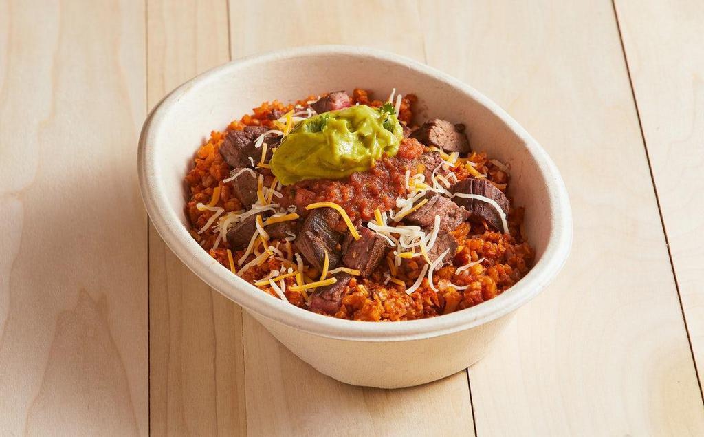 Keto Burrito Bowl · Cauliflower Rice, Steak, Salsa, Cheese, Guac