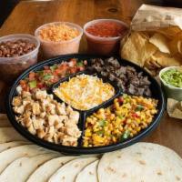 New! Taco Meal Kit · Tacos for 4-5 people - 10 tortillas, choice of 2 proteins, choice of 2 Freebies, cheese, ric...