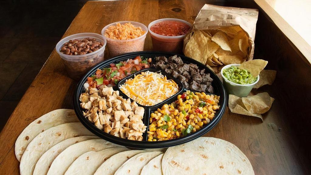 New! Taco Meal Kit · Tacos for 4-5 people - 10 tortillas, choice of 2 proteins, choice of 2 Freebies, cheese, rice, choice of beans, and salsa. Includes large bag of chips with your choice of Guac or Queso.