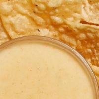 Family Chips & Queso · House-made chips with a pint of our liquid gold queso