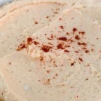 Hummus Dip · with Kalamata olives, feta cheese, extra virgin olive oil and crispy flatbread.