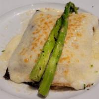 Seafood Crepes · filled with shrimp, super lump crab meat & red snapper in a classic Bechamel Sauce with aspa...