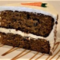 Carrot Cake · Rich moist dark cake with carrots and cream cheese icing.