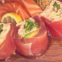 Hanabi Roll · Raw. Crab meat, avocado wrap with fresh tuna, ponzu and green onion.