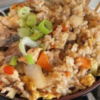 Fried Rice · Chicken, beef, shrimp, zucchini, red bell peppers, onions. carrots.