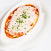 Lasagna · Ground beef, mozzarella, ricotta cheese and spices.