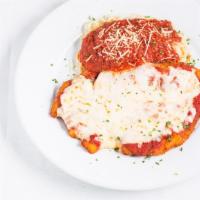 Chicken Parmigiana · Boneless, skinless chicken breast breaded and topped with parmesan and mozzarella cheese, in...