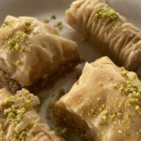 Baklava (4 Pcs.) · Fillo dough filled with nuts soaked in syrup.