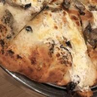 Truffle Shuffle · Fresh Mozzarella, Gorgonzola, Fontina, Parmesan, Mushrooms, Truffle Oil