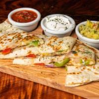 Vegetable Quesadilla · Vegetarian. Mushrooms, pepper jack, onion and bell pepper served with guacamole, sour cream ...