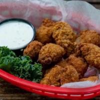 Buffalo Bites Appetizer · 8 oz. of hand-breaded, bite-sized versions of. our boneless wings. Tossed in your favorite. ...
