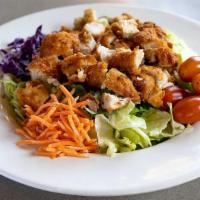 Buffalo Chicken Salad · A garden salad with chopped chicken tenders tossed in your favorite wing sauce. Bacon and ch...