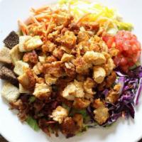 Grilled Chicken Garden Salad · Grilled chicken, iceberg, romaine, diced tomatoes, carrots, cabbage, and garlic croutons. Ba...
